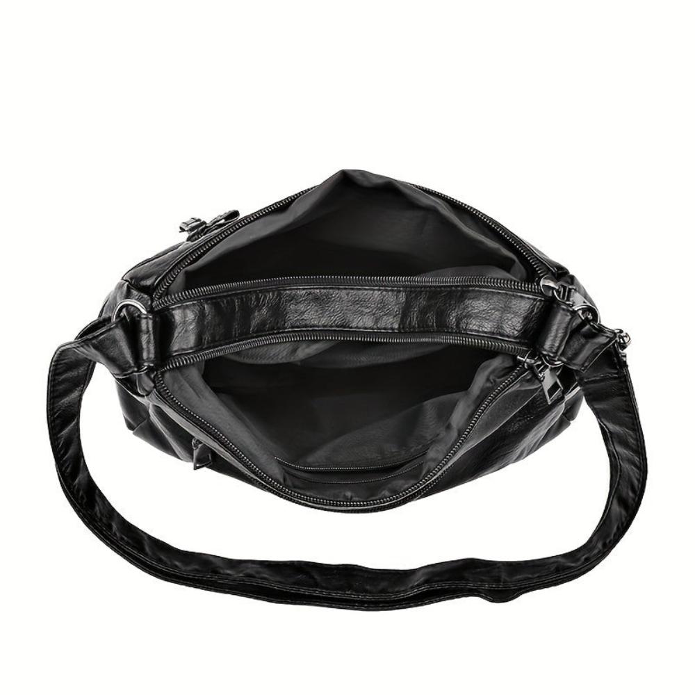 Astrid´s nitar-försedda axelremsväska | Stöldskyddad axelremsväska