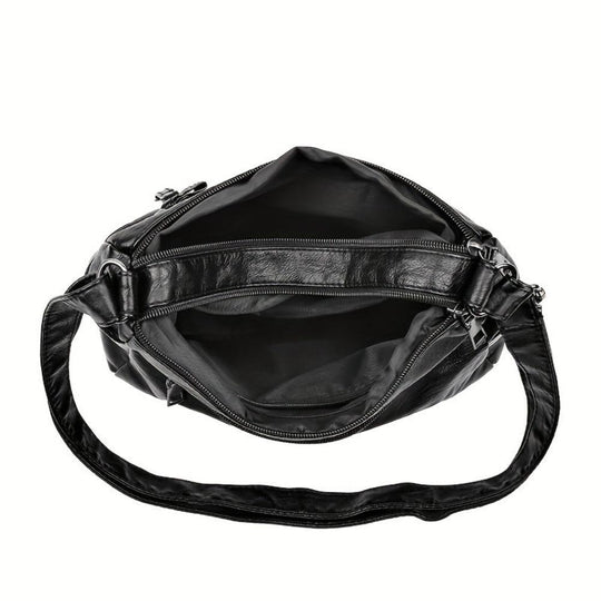 Astrid´s nitar-försedda axelremsväska | Stöldskyddad axelremsväska